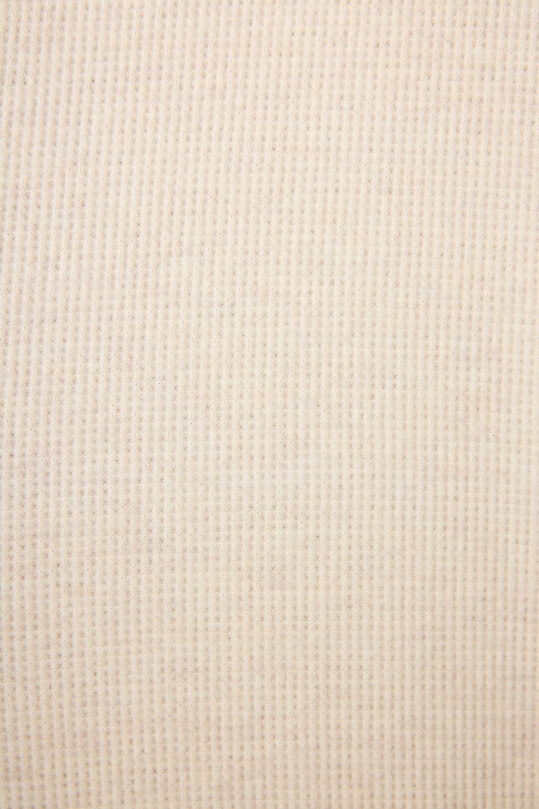 Close-up of the Cross Stitch Casuals Light Beige Lounge Set by P.J. Salvage, showcasing its beige ribbed fabric with vertical lines and a subtle textured finish for a uniform look.