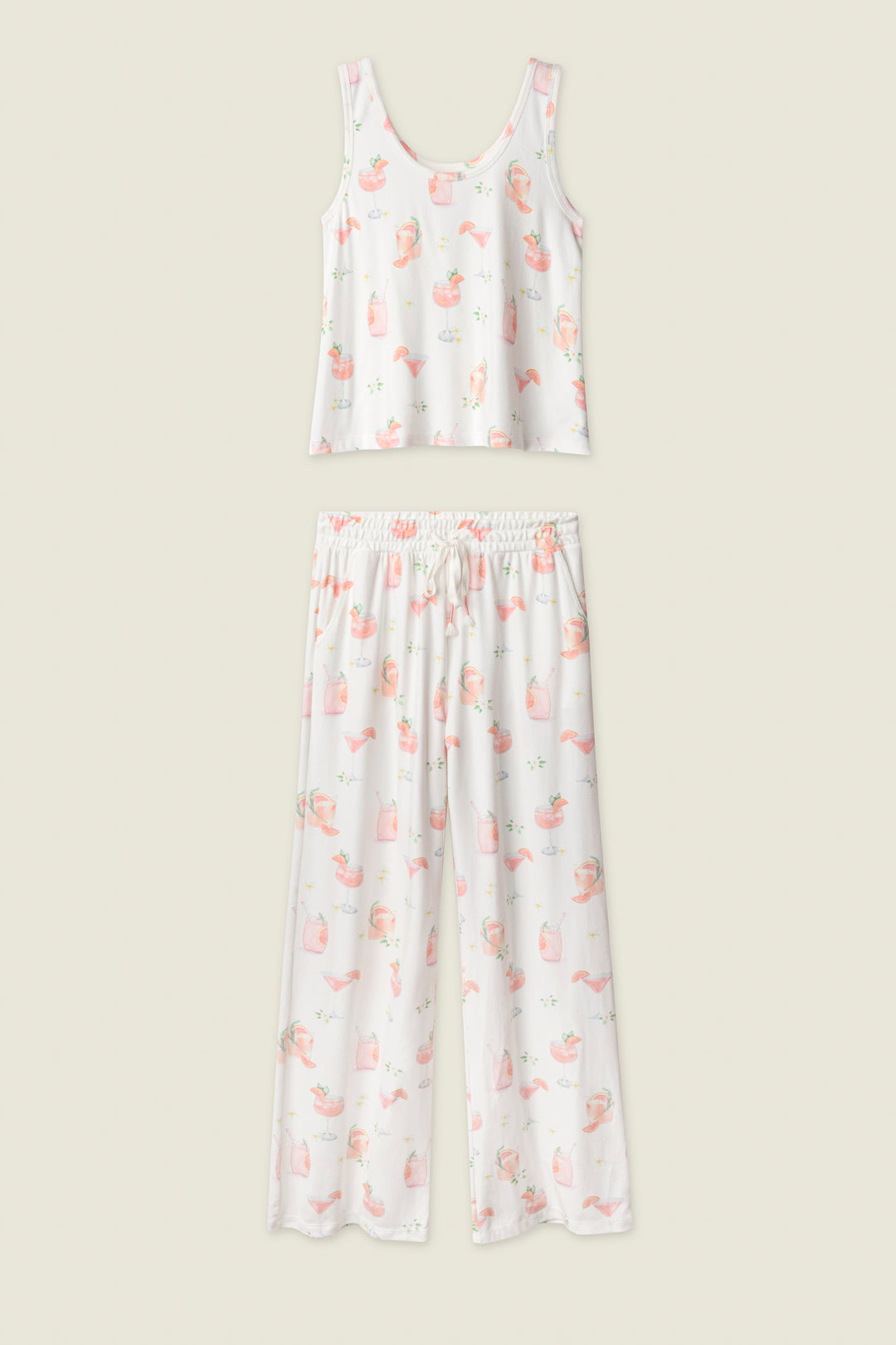 The Paloma Mama Sweet Sips Long PJ Set by P.J. Salvage features a soft ivory butter jersey tank top and pants with pink and orange animal prints, small illustrations, decorative accents, and a comfy elastic waistband.