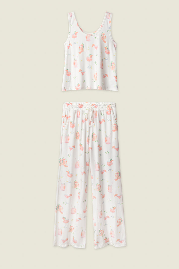 The Paloma Mama Sweet Sips Long PJ Set by P.J. Salvage features a soft ivory butter jersey tank top and pants with pink and orange animal prints, small illustrations, decorative accents, and a comfy elastic waistband.