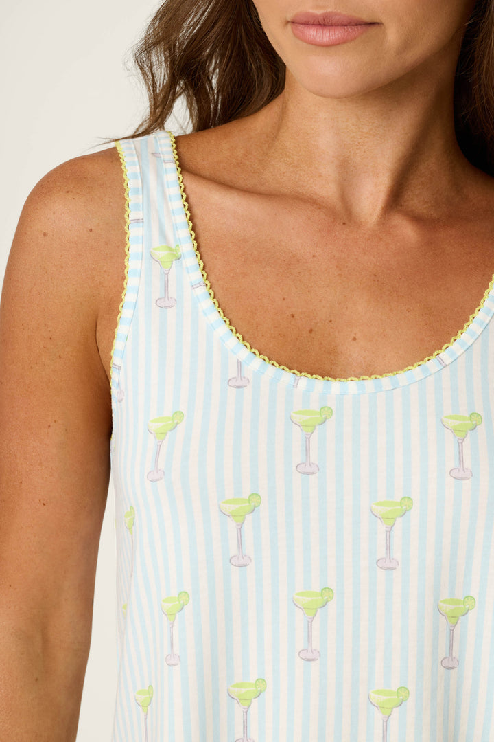 Blue and white striped fabric with margarita glass prints and yellow trim.