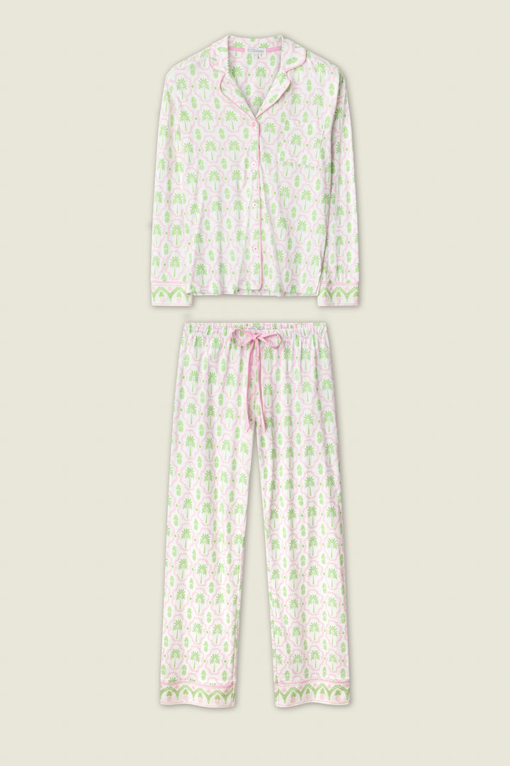 The Playful Prints Island Time Long PJ Set by P.J. Salvage is a two-piece ivory pajama set in soft cotton-modal jersey with a button-up top and drawstring pants, featuring a pink and green floral print.