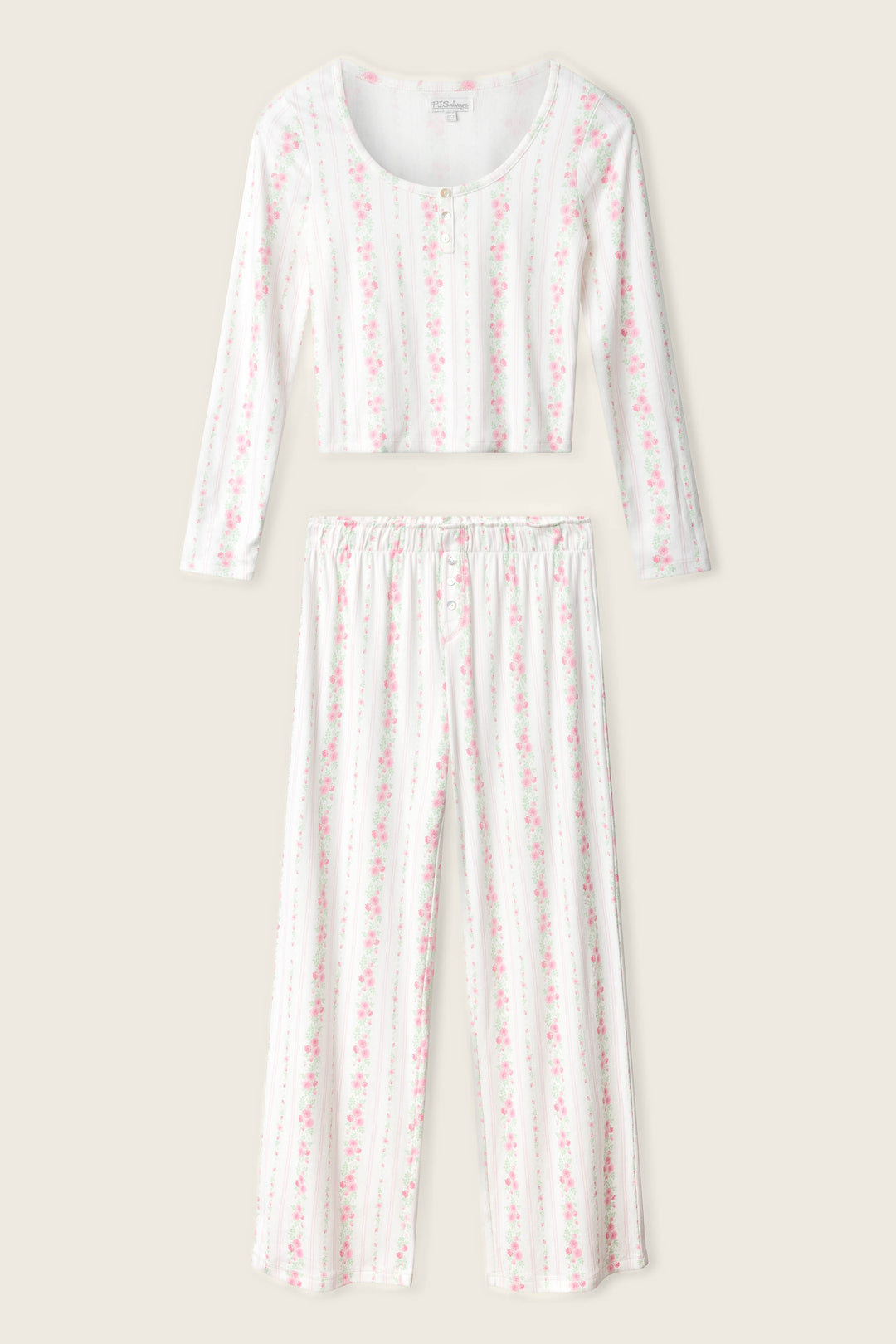 The P.J. Salvage Roses Are Pink Petal Dream Pointelle PJ Set features a scoop neck long-sleeve top and wide-leg pants with vertical pink and green stripes on white, both shown flat on a neutral background.
