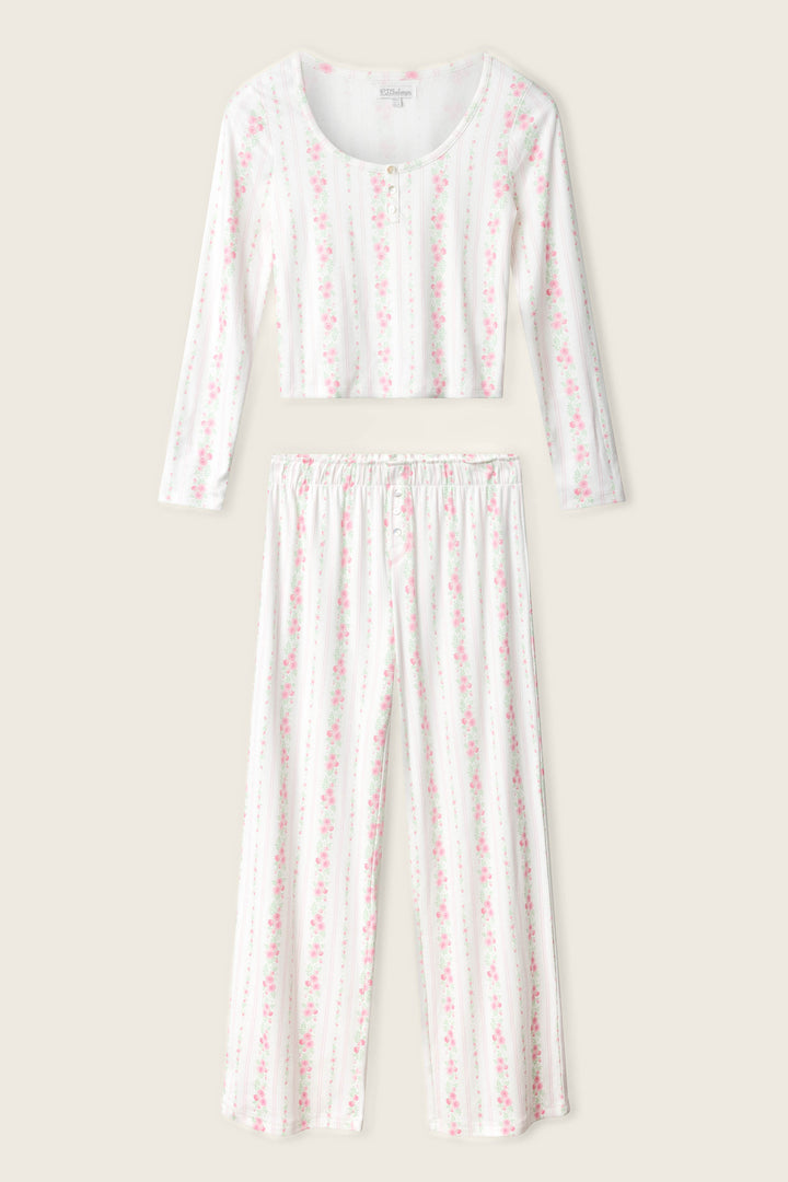 The P.J. Salvage Roses Are Pink Petal Dream Pointelle PJ Set features a scoop neck long-sleeve top and wide-leg pants with vertical pink and green stripes on white, both shown flat on a neutral background.