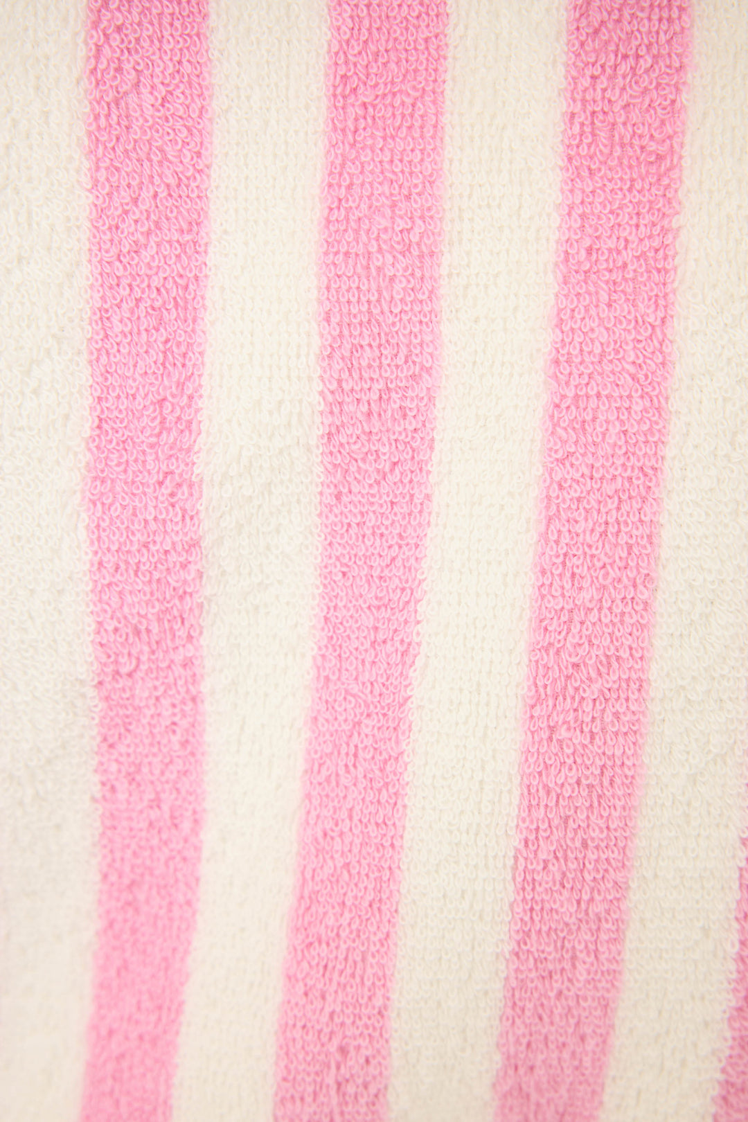 Close-up of the Playful Terry Out Of Office Robe by P.J. Salvage, featuring soft textured fabric with alternating pink and white vertical stripes, reminiscent of cozy cotton towel terry.