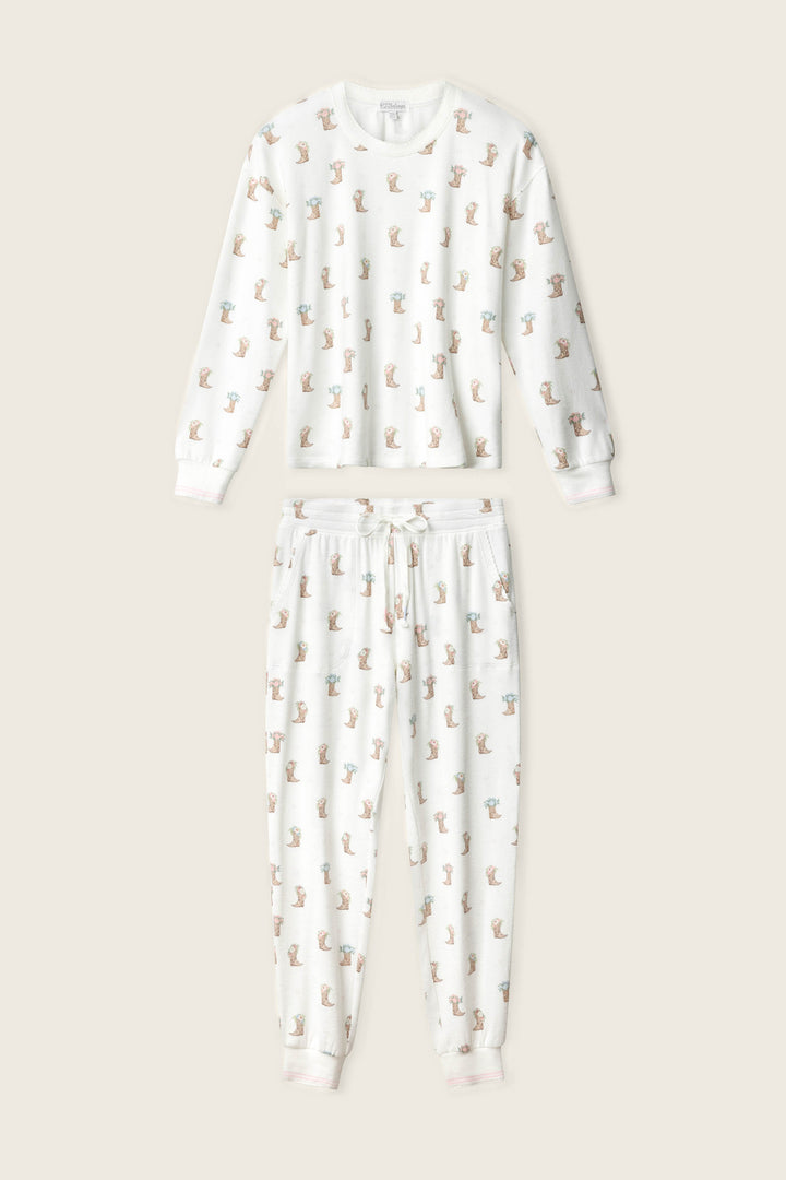The Western Blooms Boot Bouquet Lounge Set by P.J. Salvage is a light beige pajama set with long sleeves, a crew neck, drawstring waist, and features a print of small brown bears, blue birds, and acorns throughout.
