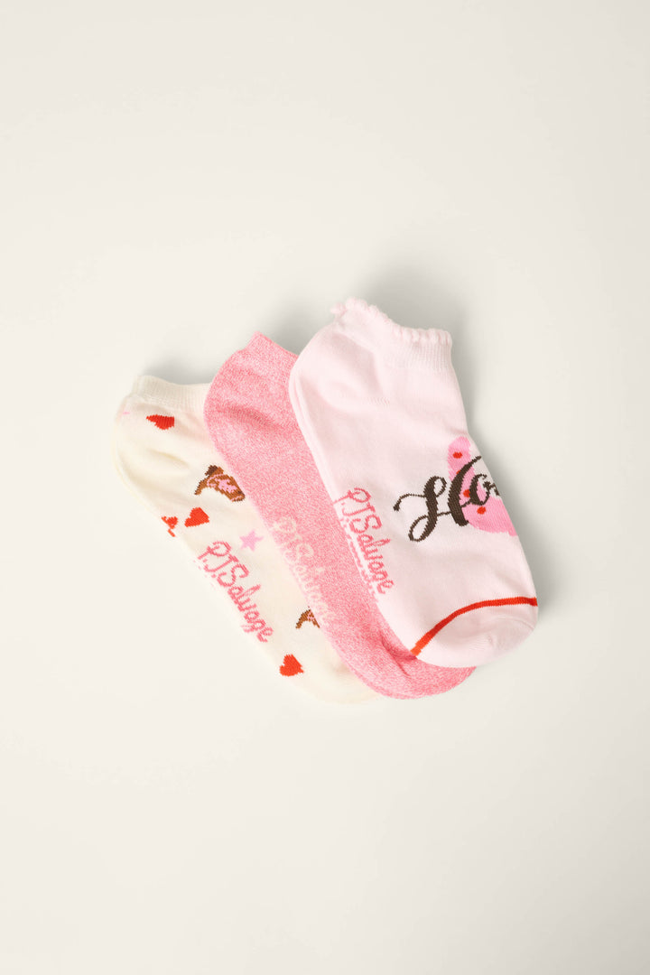 Three pairs of Western Blooms 3-Pack Ankle Socks by P.J. Salvage—white, light pink, and bright pink with heart patterns—are arranged side by side. Ideal for cozy lounging or daily wear.