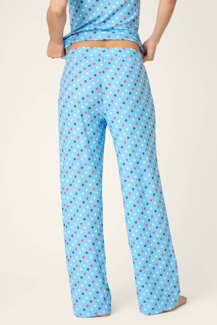 Bay blue fabric with a star print pattern, soft texture and summery feel.