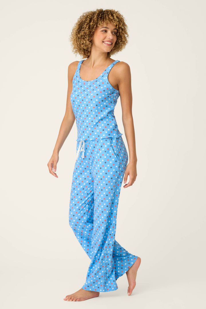 Bay blue fabric with a star print pattern, smooth in texture and evoking a summery, playful feel.