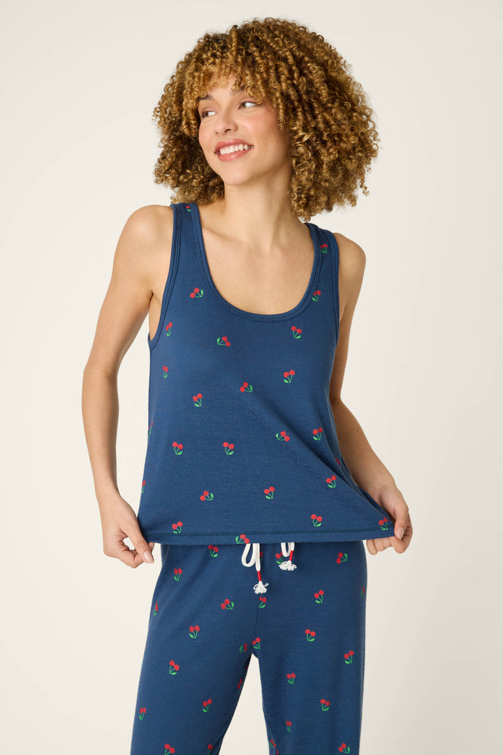 True navy fabric with a playful cherry print pattern displayed against a light background.
