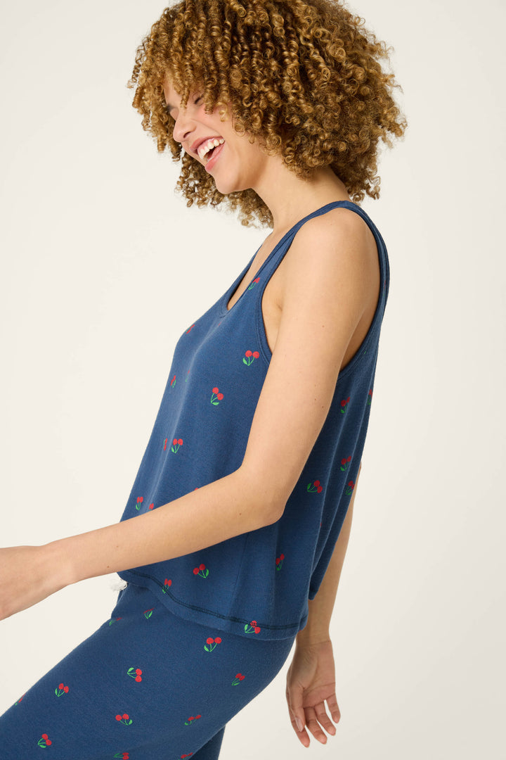 True navy fabric with a cherry print pattern.