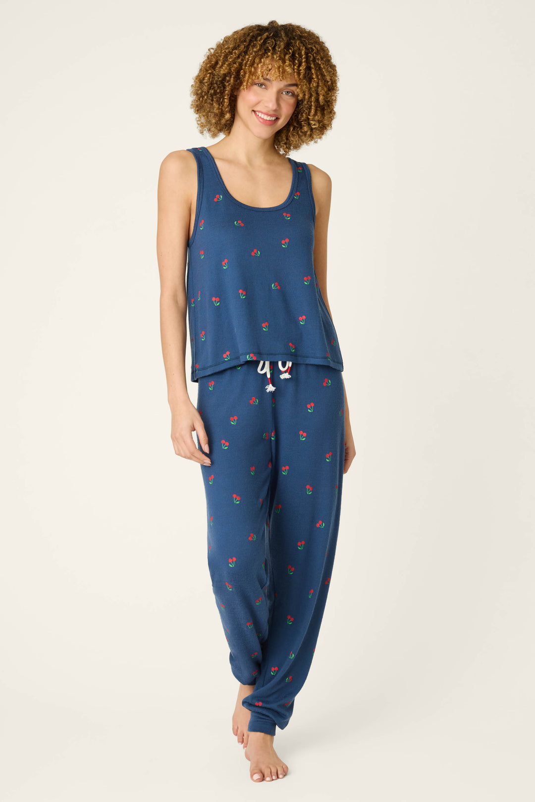 True navy fabric with a cherry print pattern.