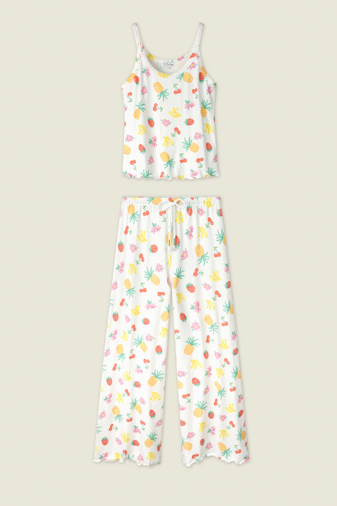 White fabric with a vibrant print of yellow bananas, green leaves, and pink flowers.