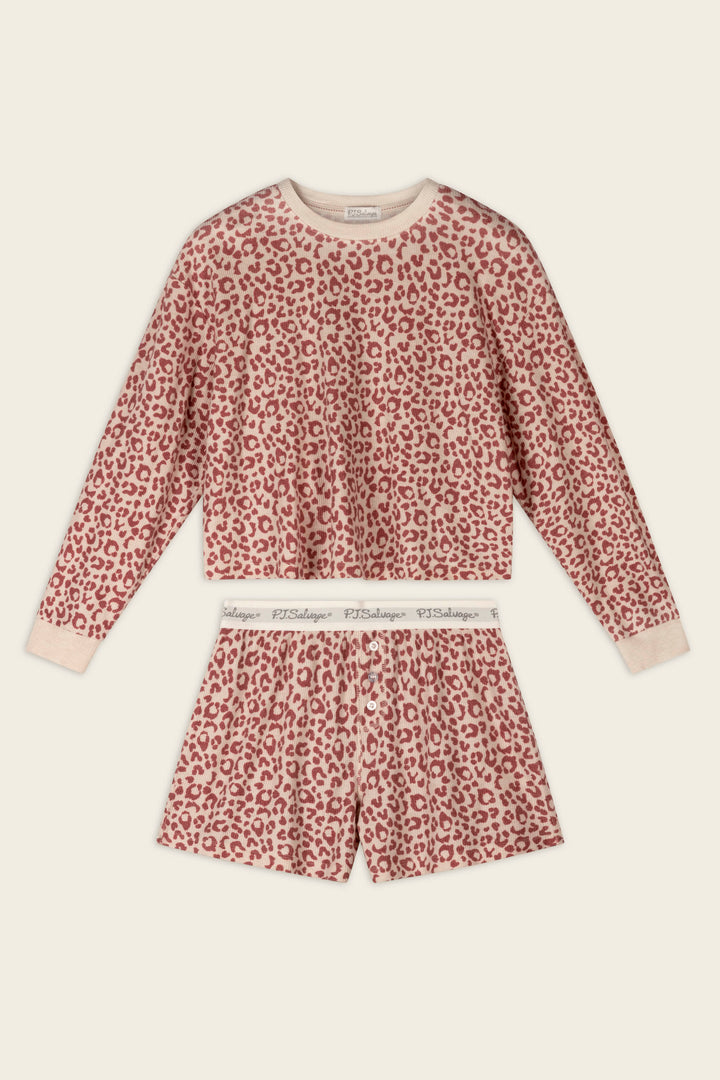 The Boyfriend Boxer Leopard Print Long Sleeve & Shorts PJ Set by P.J. Salvage features a pink and beige leopard print, with a long-sleeve top and matching shorts that have a white waistband with repeating text.