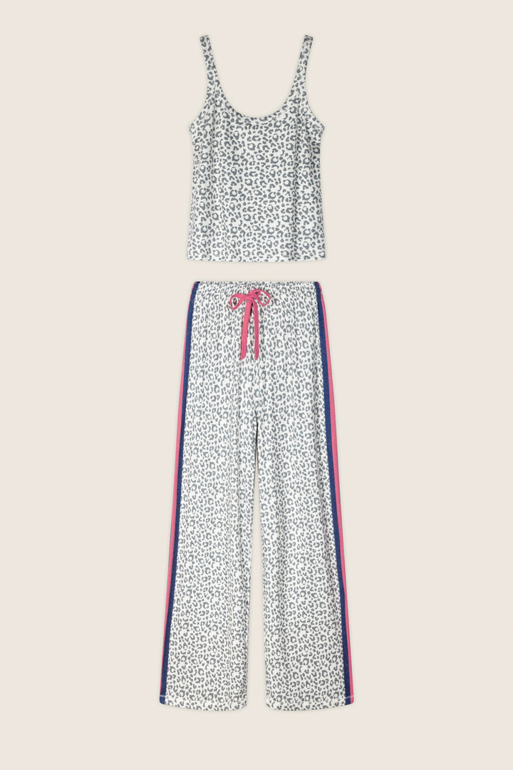 The Cat’s Meow Big Stretch Long PJ Set by P.J. Salvage features a white and gray leopard print, a sleeveless scoop-neck top, and wide-leg pants with pink and blue side stripes and a pink drawstring waist.
