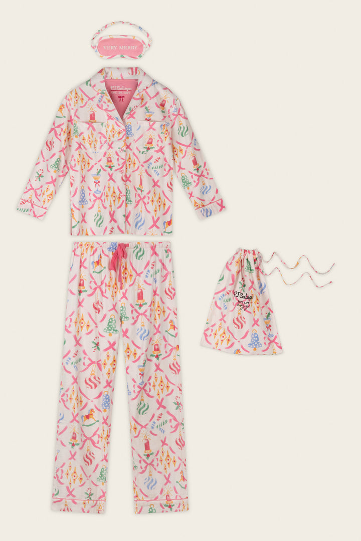 The P.J. Salvage Deck the Halls Ornament Print 4-Piece PJ Set features a colorful, patterned button-up top and pajama pants, a coordinating drawstring pouch, and a pink sleep mask embroidered with “VERY MERRY,” all displayed flat on a light background.