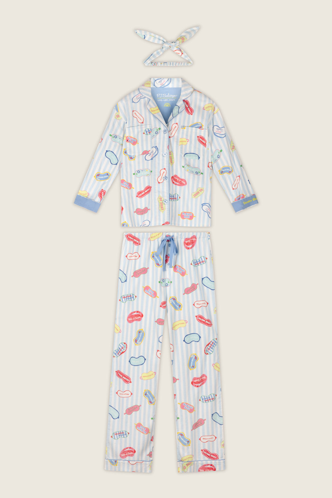 The P.J. Salvage Out of Office Eyemask Print 3-Piece Flannel PJ Set includes a light blue, long-sleeve, button-up pajama top and matching bottoms featuring playful prints of lipstick, lips, and other makeup items on a white-striped background, complete with a coordinating headband.