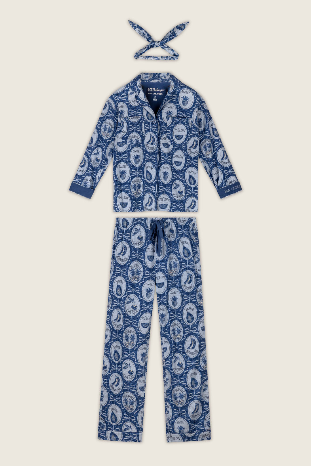 Fruit Medley Print 3-Piece Flannel PJ Set by P.J. Salvage, featuring a blue and white fruit medley pattern with a long-sleeve top, long pants, and a coordinating headband—all adorned with vintage-style illustrations.