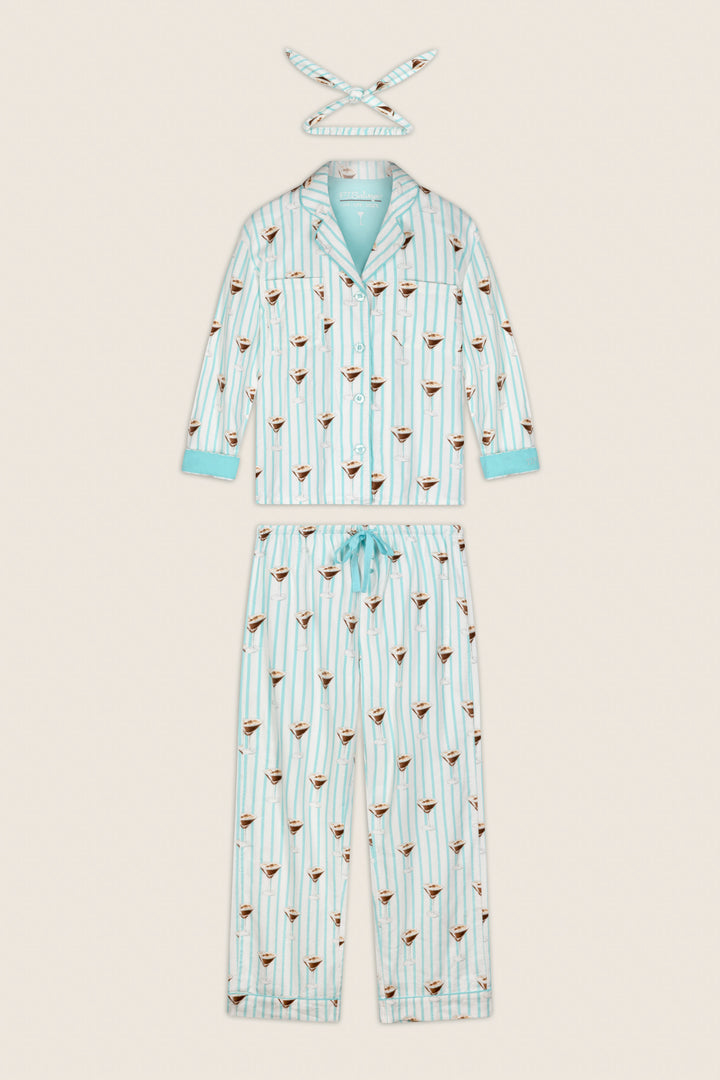 The P.J. Salvage Espresso Martini Print 3-Piece Long Sleeve Flannel PJ Set, featuring a button-up top, matching pants with a drawstring waist, and a coordinating headband, is displayed laid flat on a neutral background.