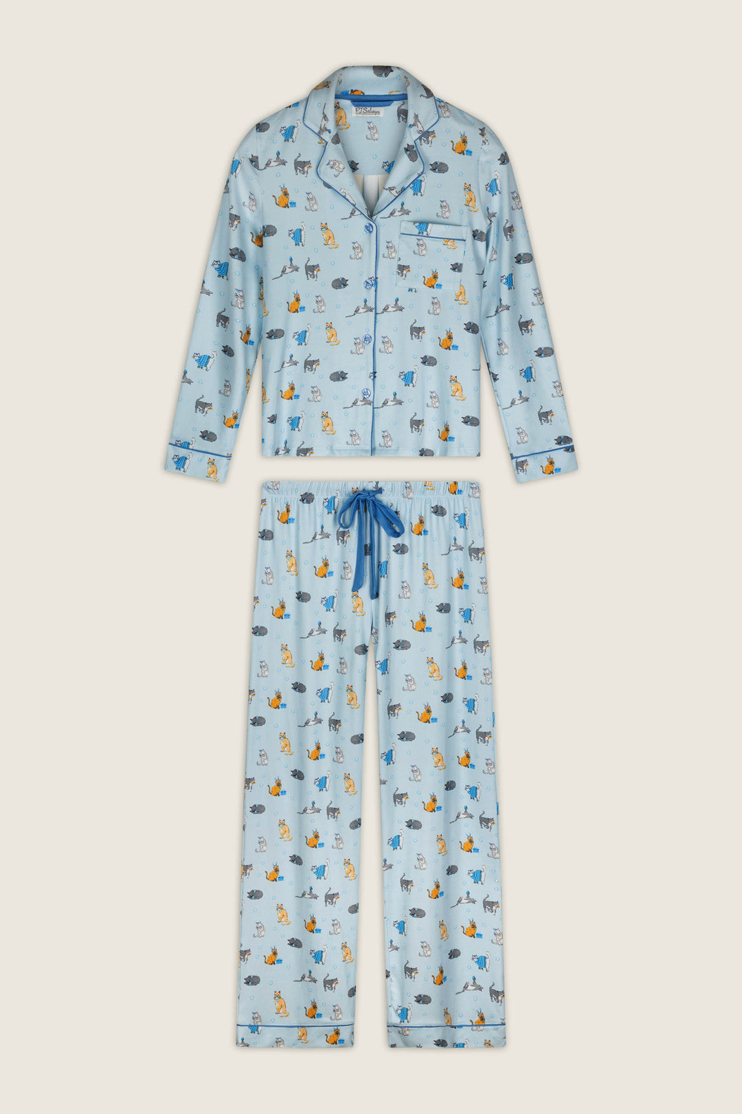 The Hanukkatz Paws for Celebration Cat Print PJ Set by P.J. Salvage features a light blue pajama set with long sleeves and pants, an all-over print of playful cartoon cats in various colors and poses, plus blue trim and a drawstring.