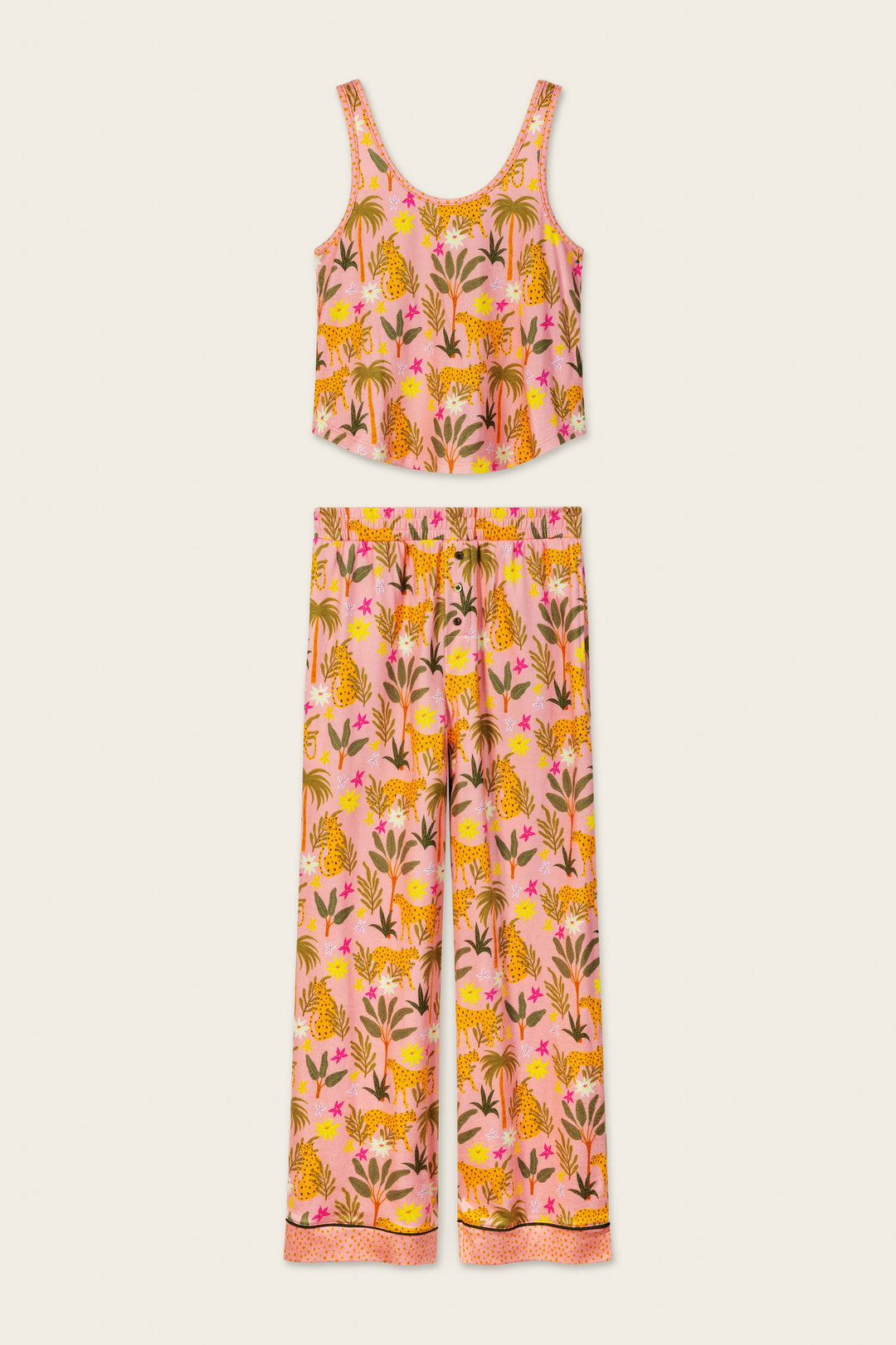 The P.J. Salvage In the Jungle Leopard Safari Long PJ Set features a sleeveless, cropped tank top and matching wide-leg pants with vibrant pink, orange, and yellow floral-tiger print—ideal for fans of soft jersey sleepwear.