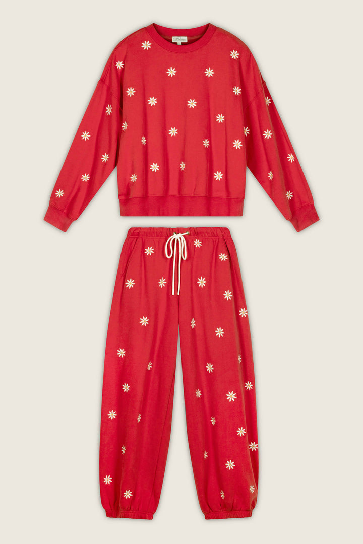 A red “Nature Is My Therapy Embroidered Flowers Frankie Sweatshirt” by P.J. Salvage, featuring white daisy flower embroidery all over, is displayed on a plain background.
