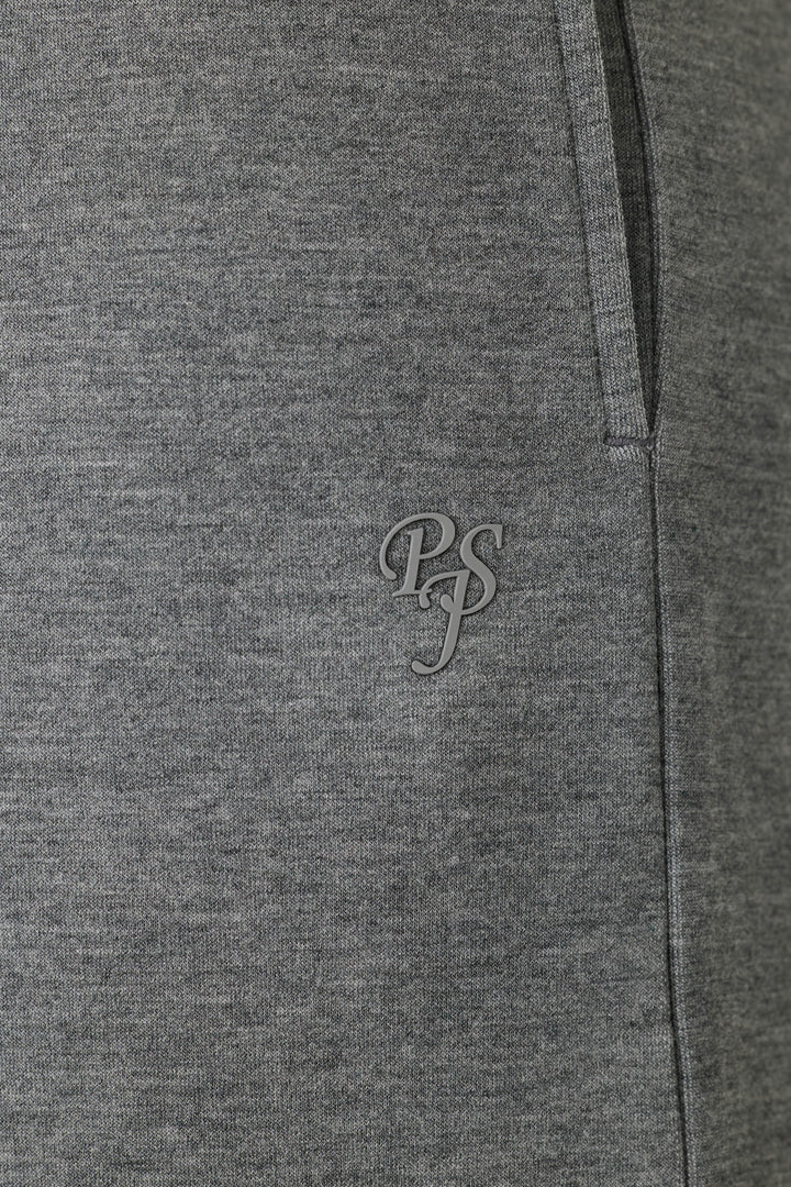 Close-up of the Nature Is My Therapy Runway Lounge Pants by P.J. Salvage, featuring soft, slightly textured grey fabric and a small P.J. Salvage logo printed near the pocket.