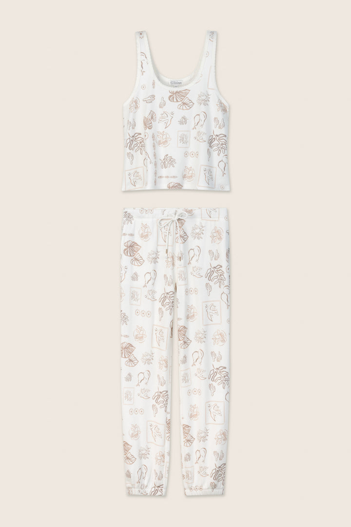 The Palms Away Bistro Botanicals Long PJ Set by P.J. Salvage features a white tank top and drawstring pants adorned with light brown botanical prints on a neutral background.