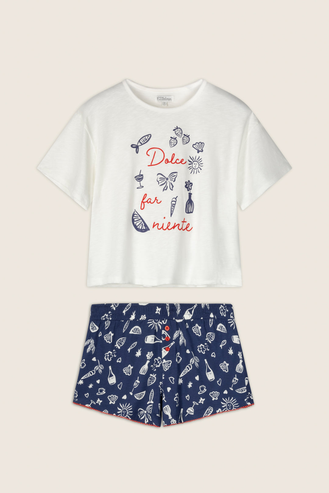 The Playful Prints Dolce Far Niente Short PJ Set by P.J. Salvage features a white cotton-modal top with “Dolce Far Niente” and blue prints, plus navy sea-patterned shorts for a breezy, Italian-inspired summer look.