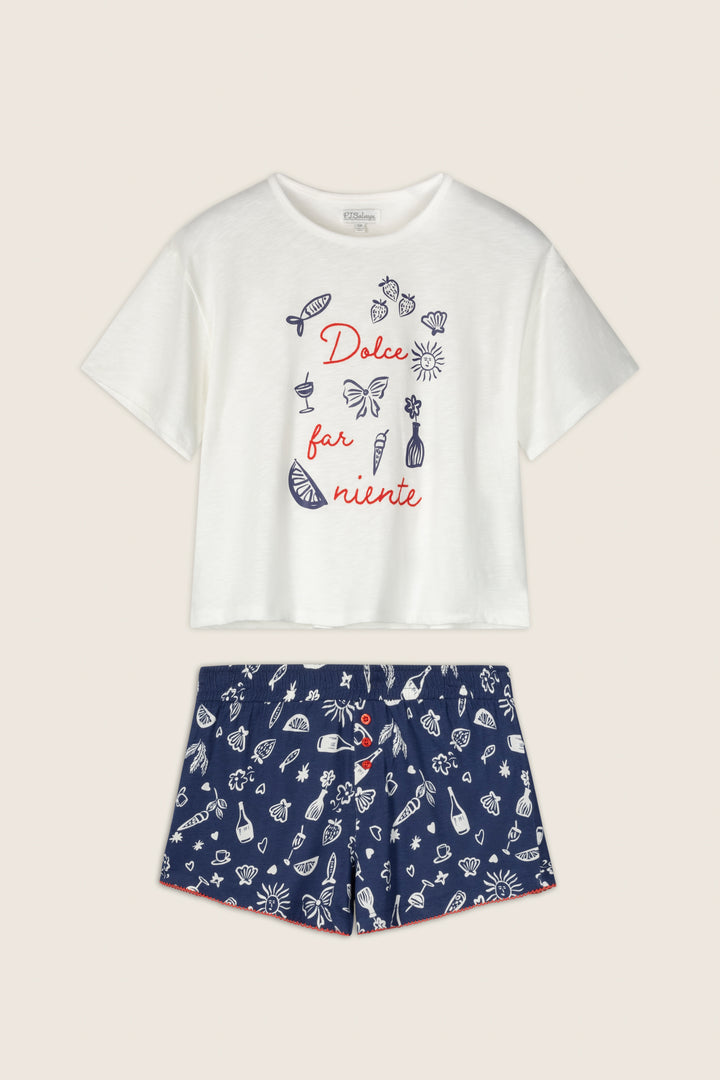 The Playful Prints Dolce Far Niente Short PJ Set by P.J. Salvage features a white cotton-modal top with “Dolce Far Niente” and blue prints, plus navy sea-patterned shorts for a breezy, Italian-inspired summer look.