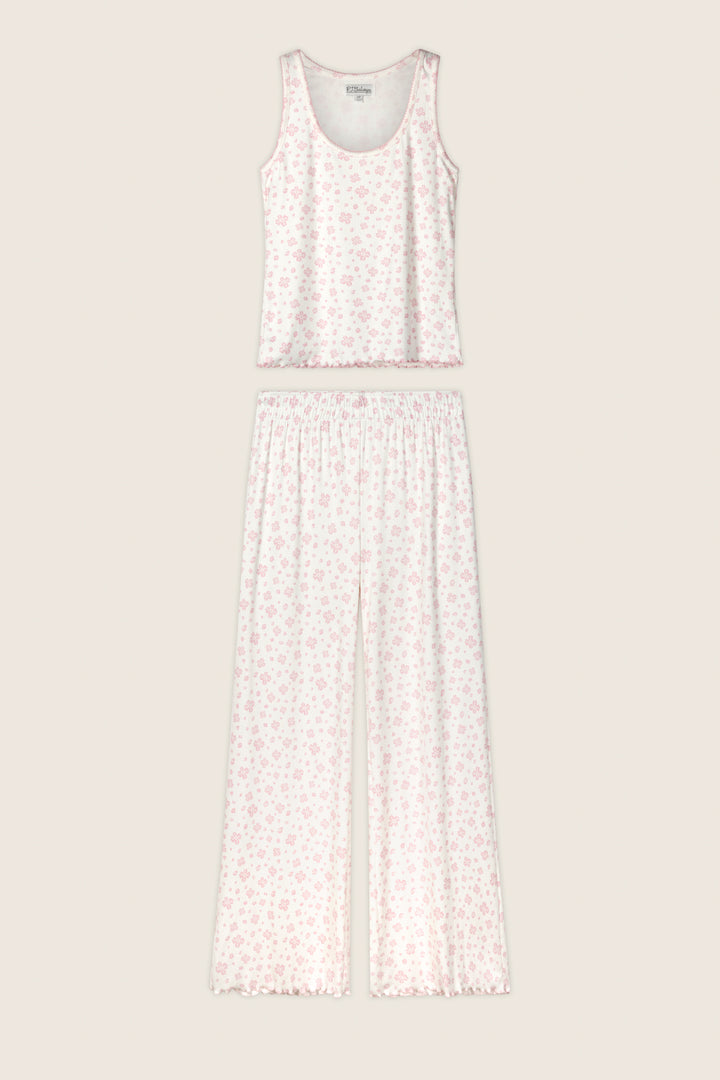 The Pretty Petals Sweet Pink Floral Print Long PJ Set by P.J. Salvage features a sleeveless tank top and wide-leg pants in white with a light pink floral pattern, displayed flat on a beige background.