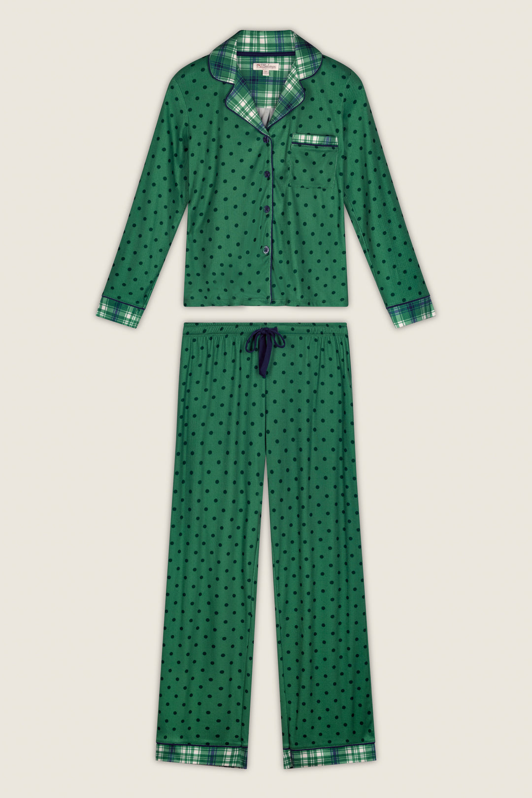 The Plaid About You Polka Dots & Plaid PJ Set by P.J. Salvage features a green long-sleeve button-up top and drawstring pants, accented with black polka dots and plaid trim on the collar, cuffs, pocket, and pant hems. The set is displayed flat on a light background.