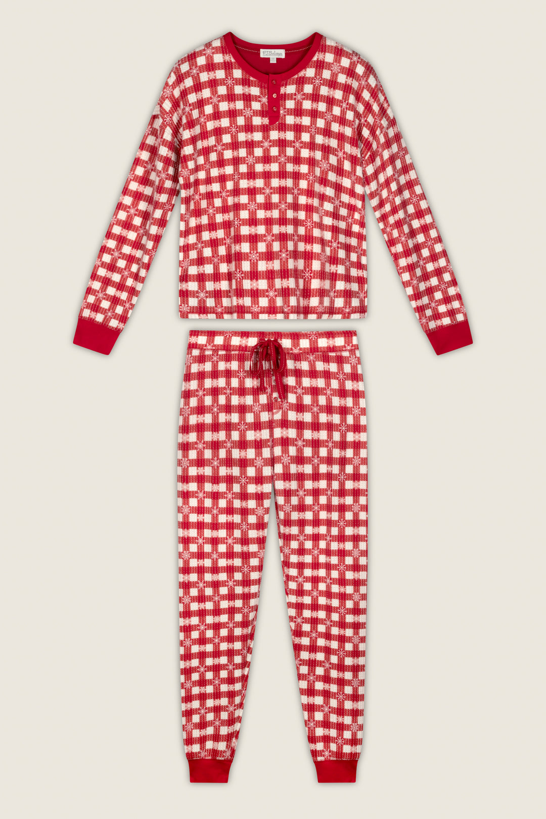 P.J. Salvage Ski Jammie Classics Snowflake Picnic Jogger PJ Set featuring a red and white plaid print, long sleeves, a buttoned neckline, and drawstring jogger pants, displayed flat on a light background.