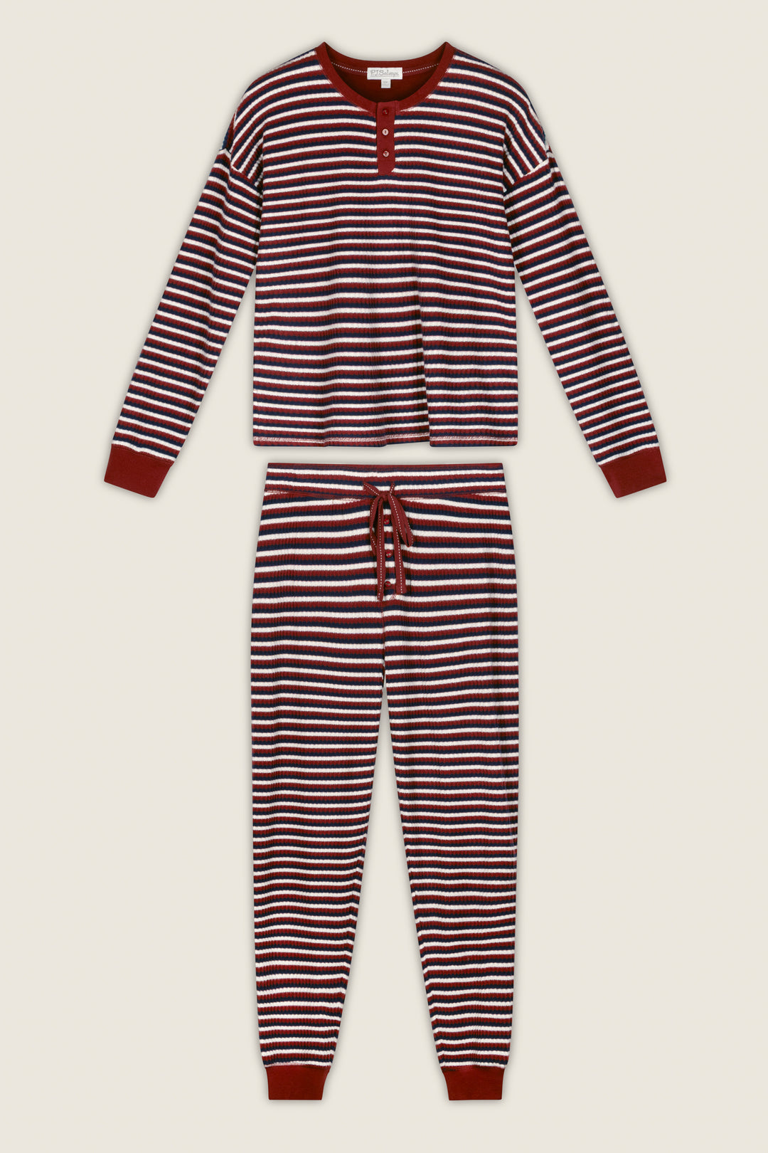 The Ski Jammie Classics Striped Long Sleeve Jogger PJ Set by P.J. Salvage is a coordinated pajama set with horizontal maroon and white stripes, featuring a buttoned top and drawstring jogger pants with maroon cuffs.
