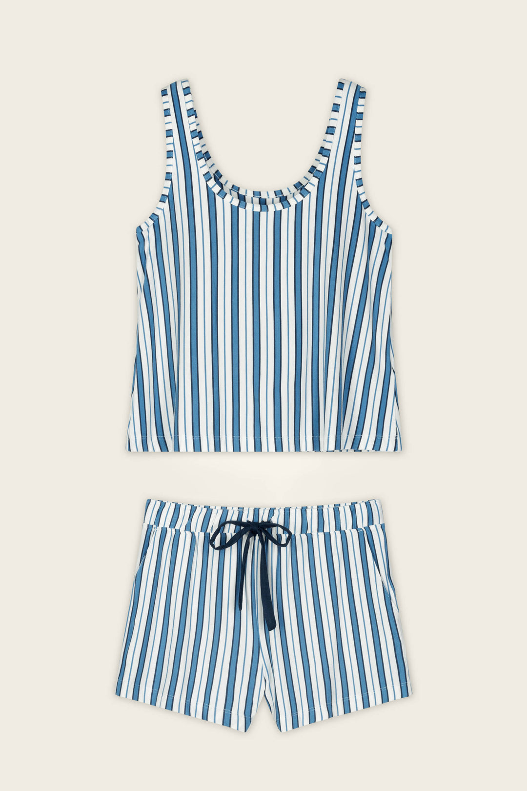 The Soiree Dreams Blue Stripe Tank & Shorts PJ Set by P.J. Salvage is displayed flat on a neutral background, featuring a blue and white vertically striped sleeveless tank top with matching shorts that include a black drawstring at the waist.