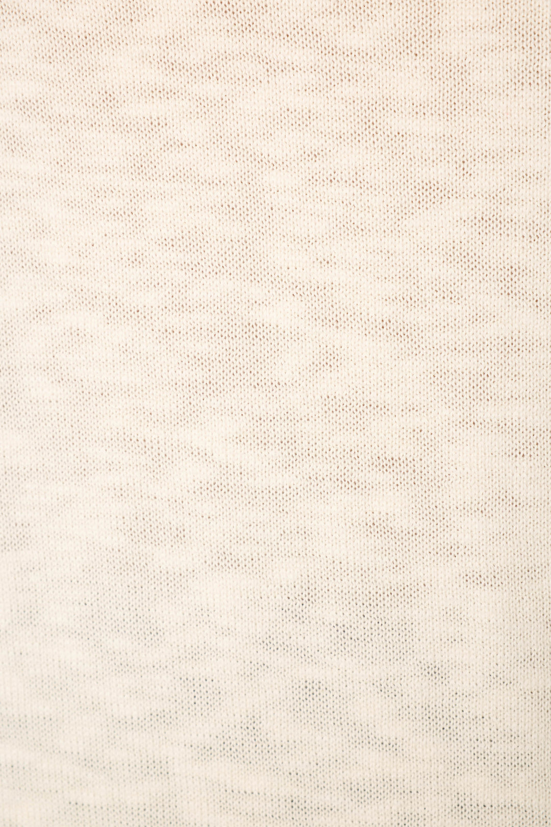 Light beige, fine knit fabric with small, evenly spaced holes and a softly textured, slightly uneven surface.