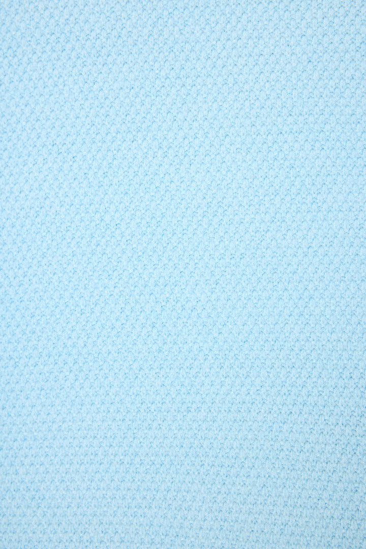 A close-up of the Sweater Weather Light Sky Pants Set by P.J. Salvage, featuring soft blue fabric—ideal for a cozy lounge look.