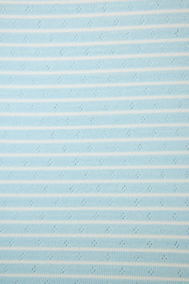 The Sweet Stripes Morning Blue Long Lounge Set by P.J. Salvage features light blue fabric with thin white horizontal stripes and a subtle texture, creating a soft, vintage-inspired look perfect for cozy lounging.