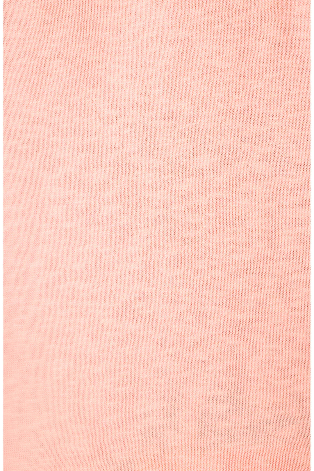 A close-up of light pink fabric with a subtle knit texture.