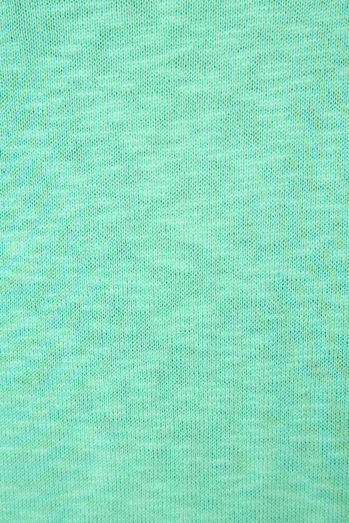 Textured knit patterns in a solid light turquoise color with subtle shading variations.