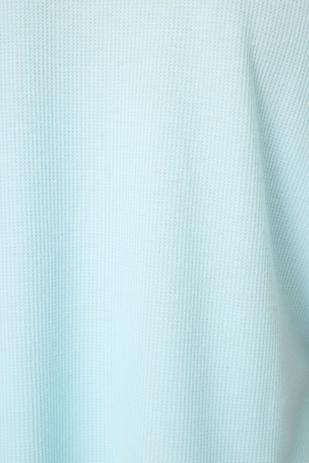 Close-up of P.J. Salvage Weekend Waffles Crystal Blue Sleep Shorts, crafted from ribbed fabric with vertical textured lines and gentle folds.