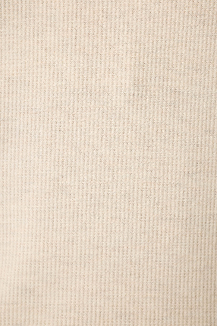 Close-up of the P.J. Salvage Weekend Waffles Light Oatmeal Sleep Shorts, featuring beige corduroy with vertical ridges, a soft textured finish, and an adjustable drawstring waist.