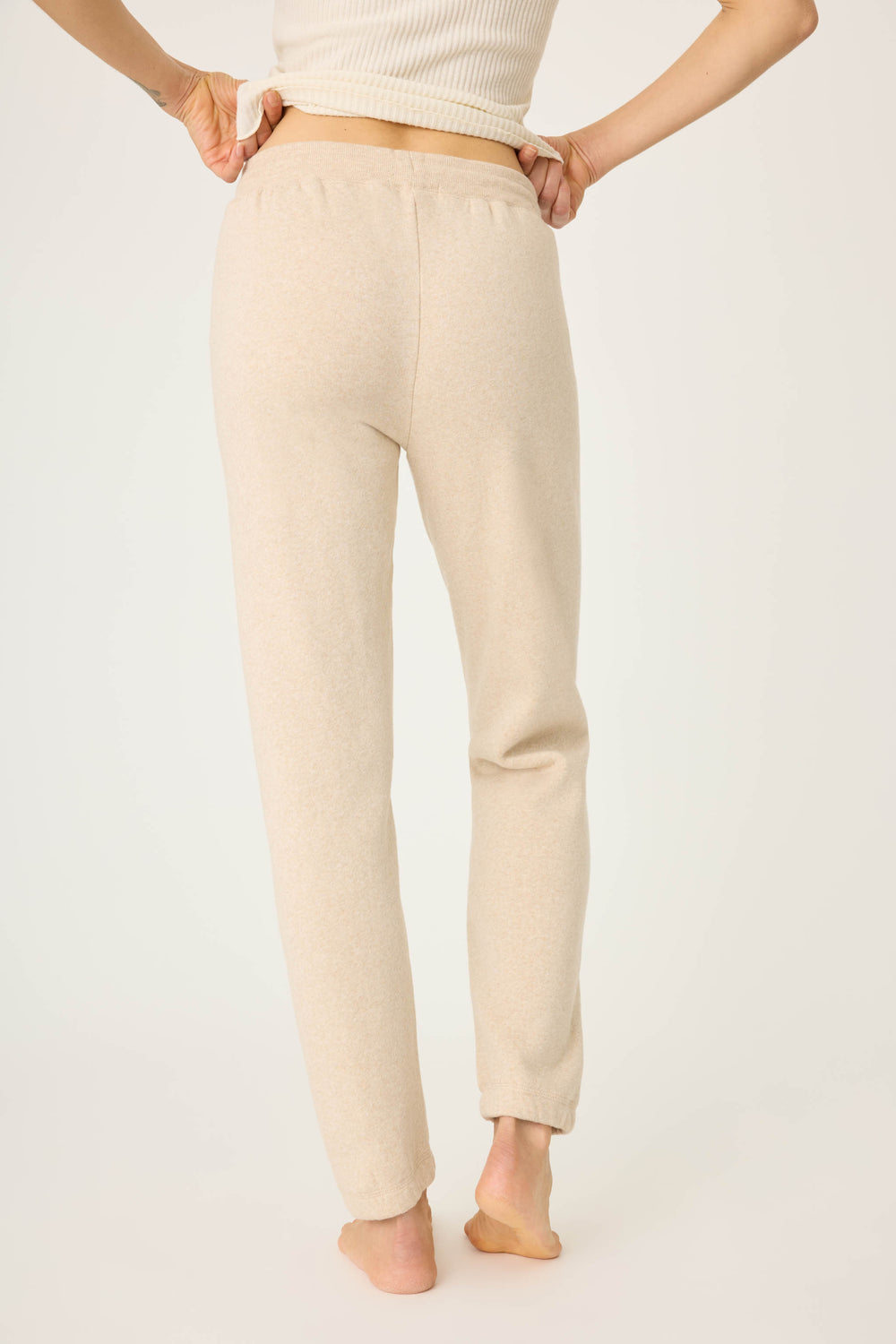 Women's oatmeal jogger pant with red boucle heart applique. Oatmeal cloud terry with tie waist.