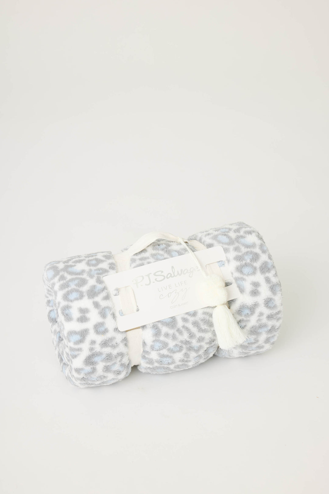 Reversible blanket in grey-white leopard print. Personal size blanket with carry strap.