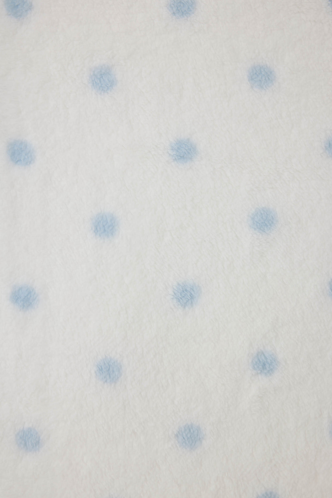 Reversible blanket in ivory polka dot print. Personal size blanket with carry strap.