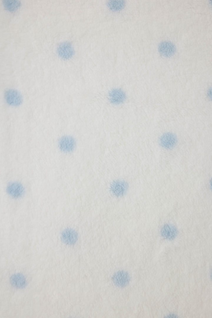 Reversible blanket in ivory polka dot print. Personal size blanket with carry strap.