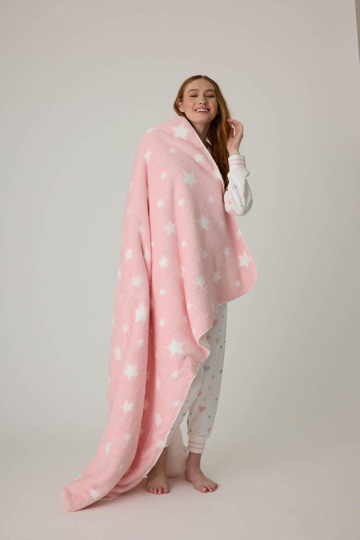 Reversible blanket in pink-white star print. Personal size blanket with carry strap.