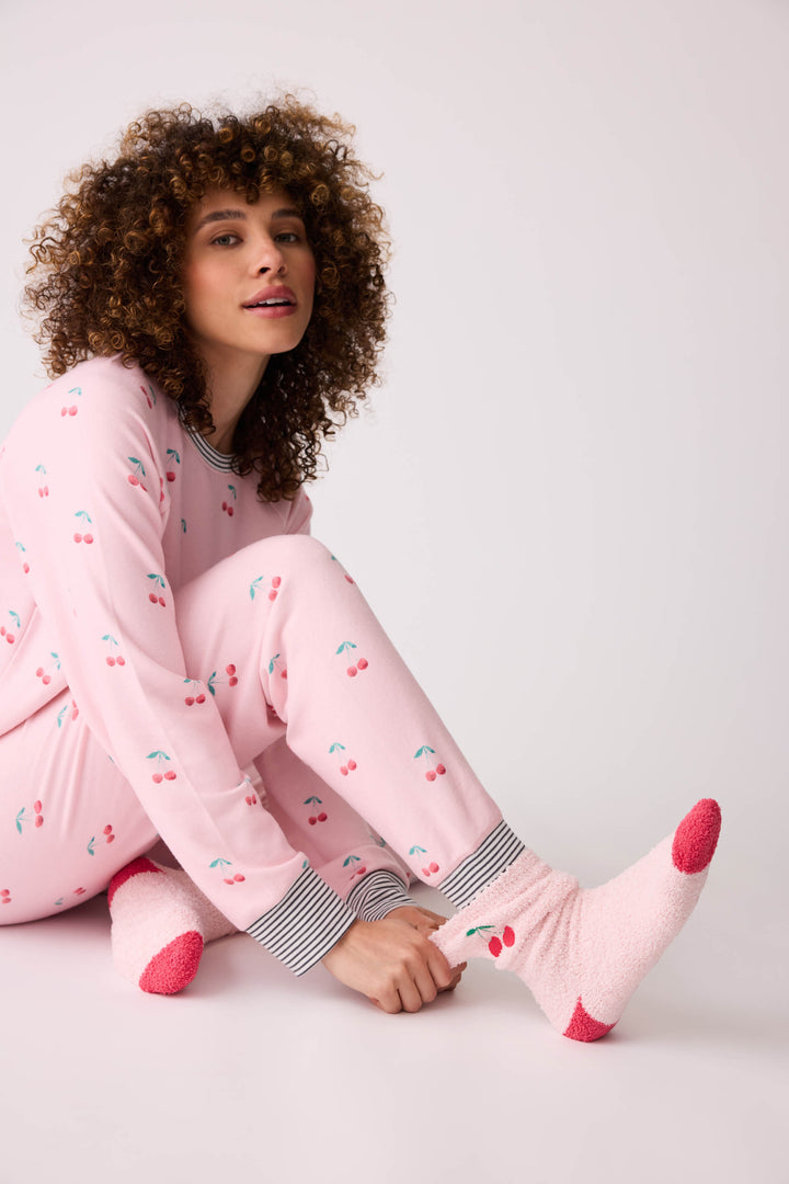 Women's pale pink and red socks with cherry embroidery.
