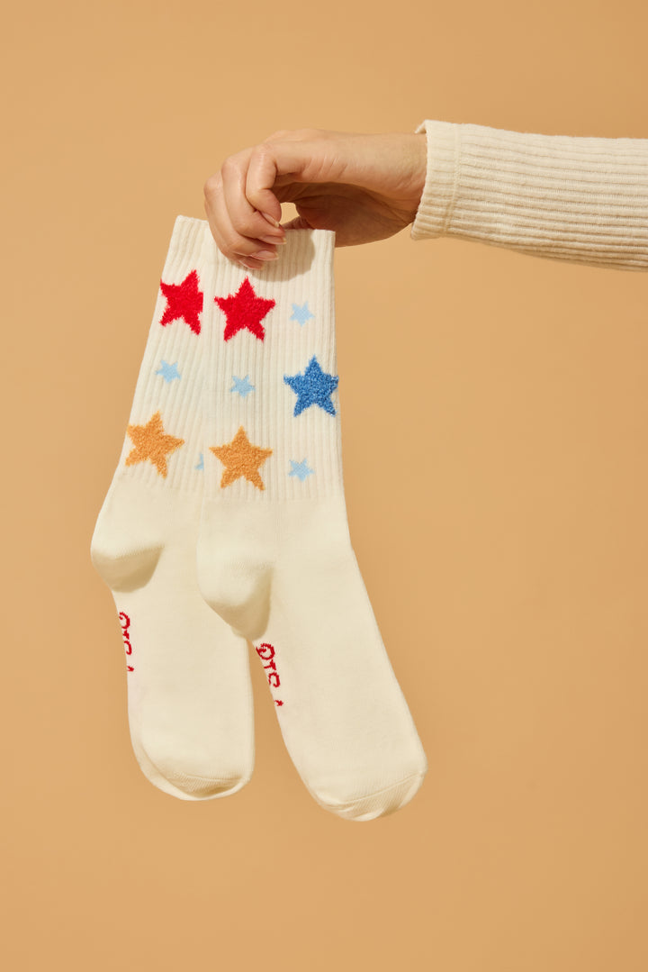 Women's 1-pack crew socks. Women's & girls' ivory sock with feather Yarn multicolored Stars.
