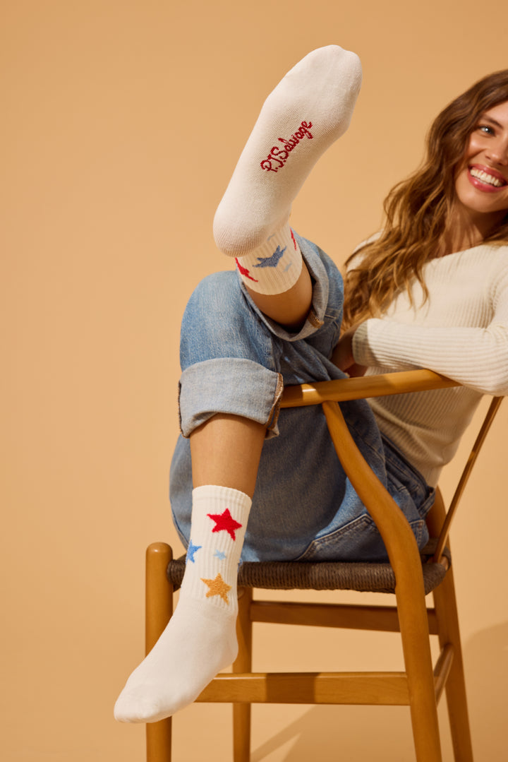 Women's 1-pack crew socks. Women's & girls' ivory sock with feather Yarn multicolored Stars.