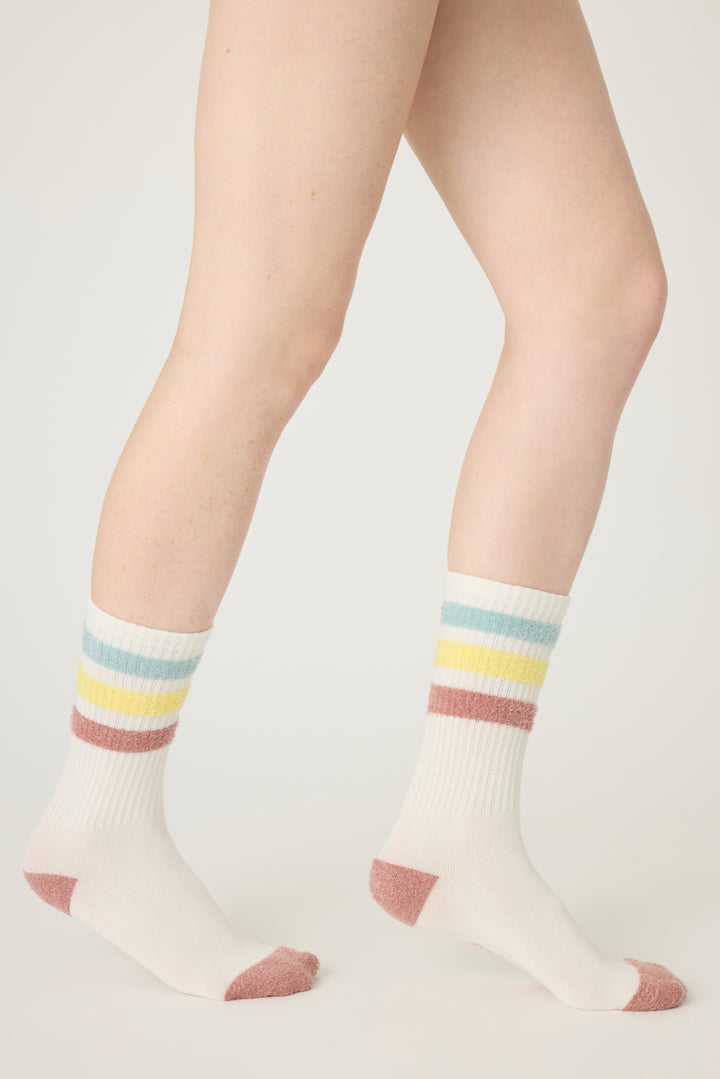 1-pack crew sock with feather yarn pastel stripes. Women & girls ivory sock with gripper soles.